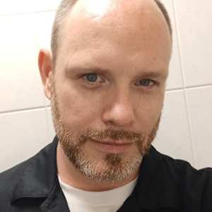 Photo of Adam Cousins