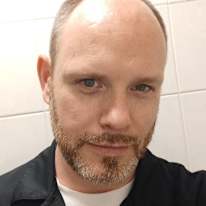 Photo of Adam Cousins